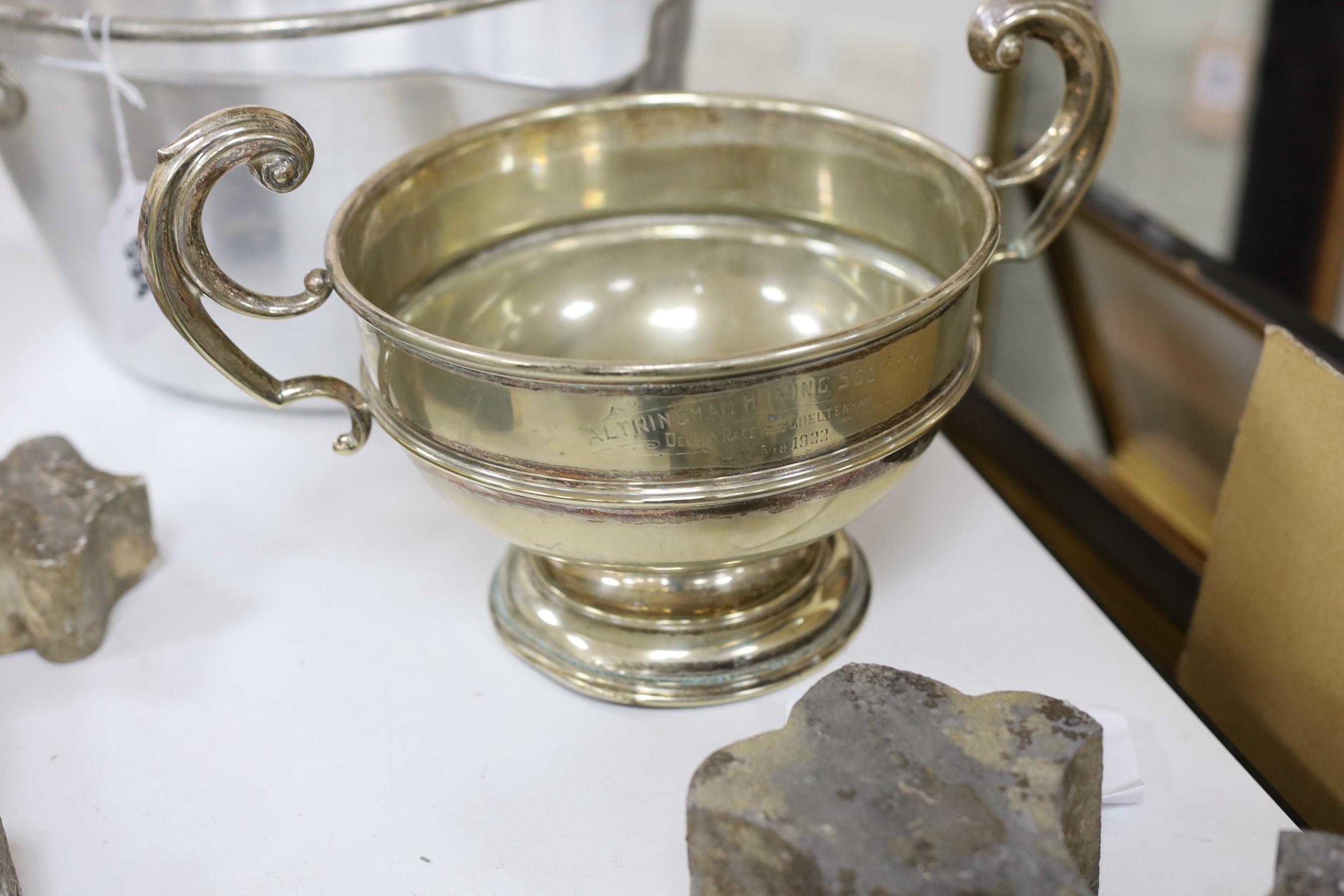 A group of assorted metalwares including plated wares, irons, scales, miniature candlesticks etc.